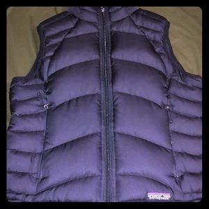 Black puffy Patagonia vest.